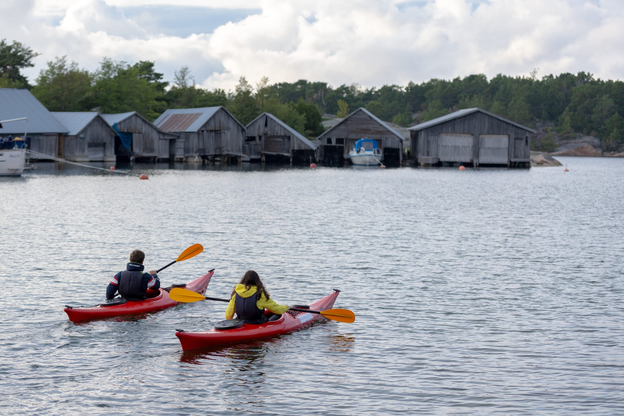 People kayaking in the baltic sea in Åland.